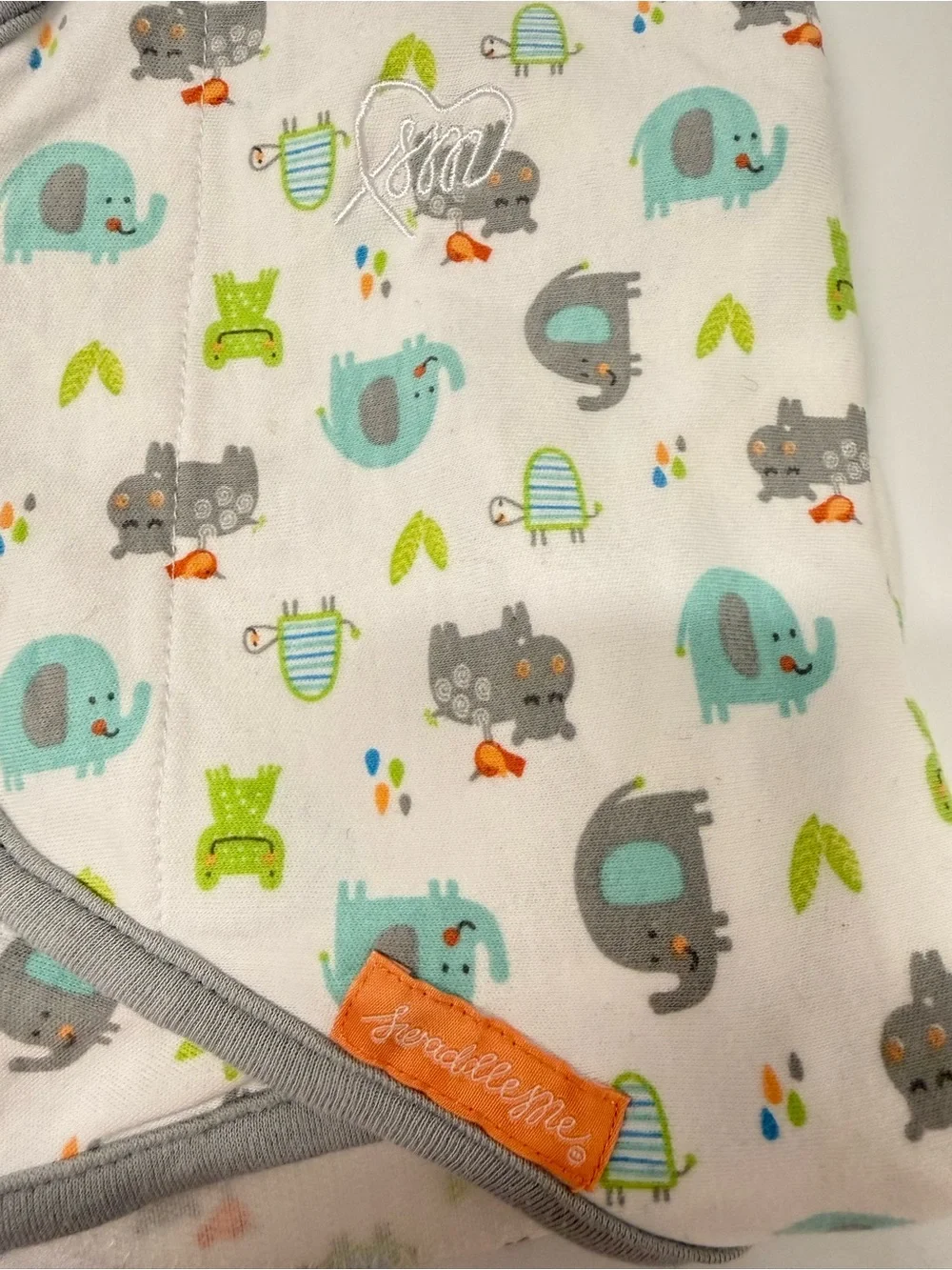 SwaddleMe Baby Swaddle - White with Teal, Gray & Lime Animal Print